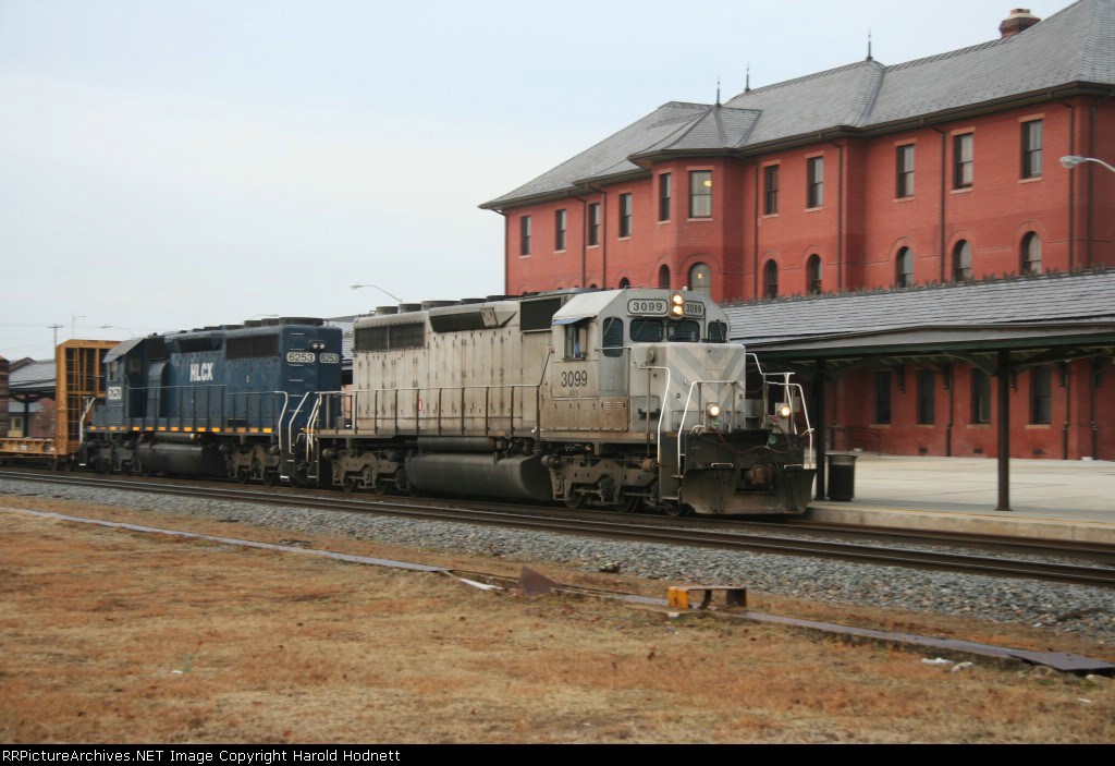 GCFX 3099 & HLCX 6253 lead train F774-13
